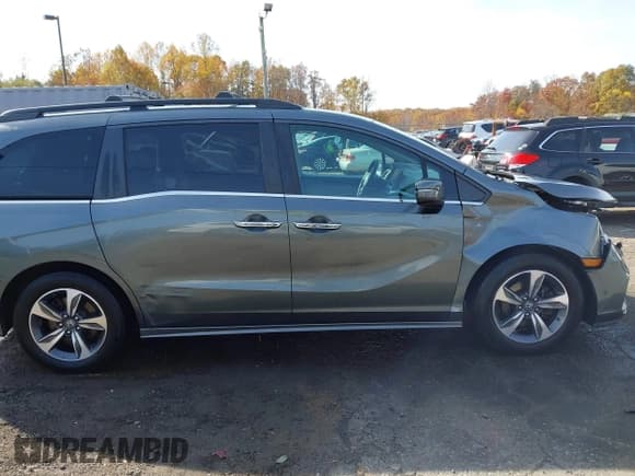 ✅ 2018 Honda Odyssey Touring • VIN: 5FNRL6H85JB044090 • Lot: 43648114. Wystawiony na IAAI z przebiegiem 153 287 mil. Bezpłatny archiwum sprzedaży aukcyjnych z USA i szczegółowy raport historii pojazdu na DreamBid. Zdjęcie 13.