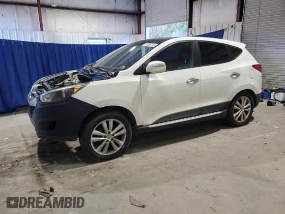 2012 Hyundai Tucson Limited z VIN KM8JUCAC4CU381590, wystawiony jako Copart lot #91350795 z przebiegiem 510 791 mil mil oraz Czysty tytuł • Clean title. Historia ofert i sprzedaży dostępna na DreamBid. Obrazek 1.