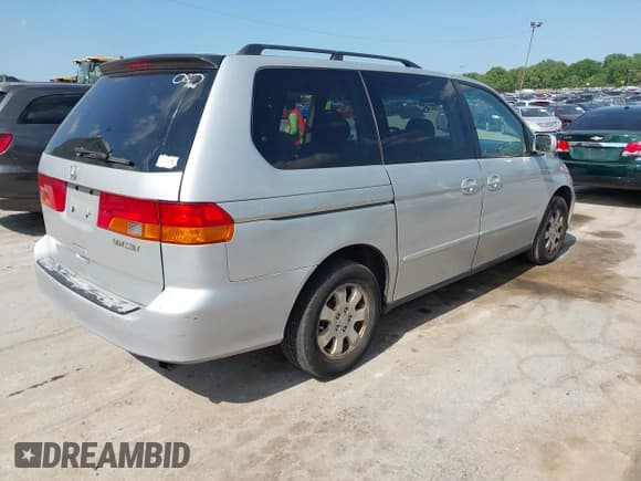 ✅ 2002 Honda Odyssey EX-L • VIN: 2HKRL18032H504640 • Lot: 42647259. Listed on IAAI with Not provided. Free auction sales archive from the USA and detailed vehicle history report at DreamBid. Image 4.