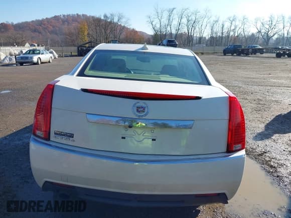 ✅ 2013 Cadillac CTS Luxury • VIN: 1G6DG5E51D0157141 • Лот: 43721351. Опубликован ранее на IAAI с пробегом 119 383 миль. Бесплатный доступ к архиву аукционных продаж из США и подробный отчёт об истории автомобиля на DreamBid. Изображение 17.