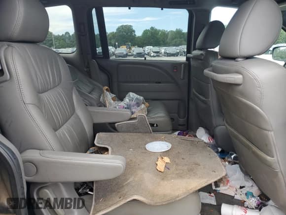 ✅ 2009 Honda Odyssey EX-L • VIN: 5FNRL38739B018122 • Лот: 70108105. Опубликован ранее на Copart с пробегом 237 839 миль. Бесплатный доступ к архиву аукционных продаж из США и подробный отчёт об истории автомобиля на DreamBid. Изображение 11.