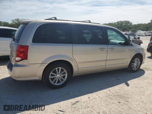 2014 Dodge Grand Caravan SXT z VIN 2C4RDGCG7ER321169, wystawiony jako Copart lot #70516105 z przebiegiem 187 876 mil mil oraz Szkoda całkowita • Salvage title. Historia ofert i sprzedaży dostępna na DreamBid. Obrazek 3.