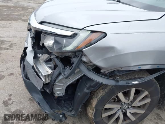 ✅ 2021 Honda Pilot EX • VIN: 5FNYF5H36MB039437 • Lot: 42542622. Listed on IAAI with 65,098 mi. Free auction sales archive from the USA and detailed vehicle history report at DreamBid. Image 17.