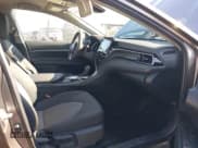 ✅ 2021 Toyota Camry Hybrid LE • VIN: 4T1C31AK5MU026212 • Lot: 43577804. Listed on IAAI with 33,718 mi. Free auction sales archive from the USA and detailed vehicle history report at DreamBid. Image 5.