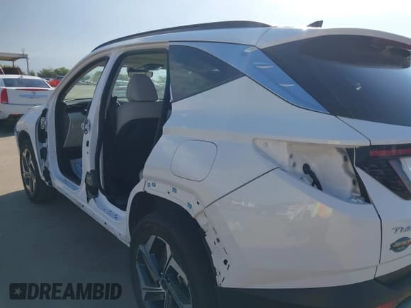 ✅ 2023 Hyundai Tucson Limited • VIN: 5NMJECAE8PH267883 • Lot: 43267605. Listed on IAAI with 22,496 mi. Free auction sales archive from the USA and detailed vehicle history report at DreamBid. Image 19.
