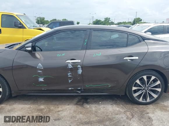 ✅ 2016 Nissan Maxima S • VIN: 1N4AA6AP7GC401110 • Lot: 42653301. Listed on IAAI with 76,609 mi. Free auction sales archive from the USA and detailed vehicle history report at DreamBid. Image 14.