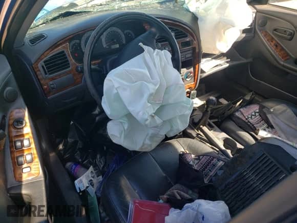 2003 Hyundai Elantra GT z VIN KMHDN55D53U101541, wystawiony jako Copart lot #76377764 z przebiegiem 170 042 mil mil oraz Szkoda całkowita • Salvage title. Historia ofert i sprzedaży dostępna na DreamBid. Obrazek 8.