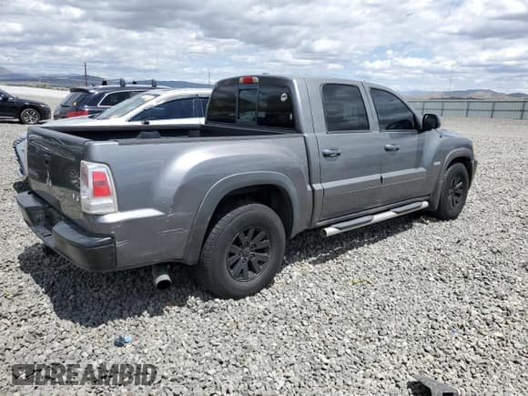 ✅ 2006 Mitsubishi Raider Duro Cross • VIN: 1Z7HC38N86S542959 • Lot: 57301385. Listed on Copart with 149,167 mi. Free auction sales archive from the USA and detailed vehicle history report at DreamBid. Image 3.