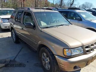 ✅ 2001 Isuzu Rodeo S • VIN: 4S2CK58W414322118 • Лот: 41496624. Опубликован ранее на IAAI с пробегом 244 189 миль. Бесплатный доступ к архиву аукционных продаж из США и подробный отчёт об истории автомобиля на DreamBid. Изображение 1.