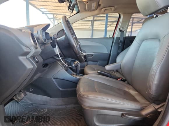 ✅ 2012 Chevrolet Sonic LTZ • VIN: 1G1JE6SH3C4167034 • Lot: 86705675. Listed on Copart with 105,702 mi. Free auction sales archive from the USA and detailed vehicle history report at DreamBid. Image 7.