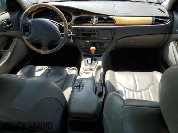 ✅ 2002 Jaguar S-Type • VIN: SAJDA01N82FM37027 • Лот: 60740595. Опубликован ранее на Copart с пробегом 131 179 миль. Бесплатный доступ к архиву аукционных продаж из США и подробный отчёт об истории автомобиля на DreamBid. Изображение 8.