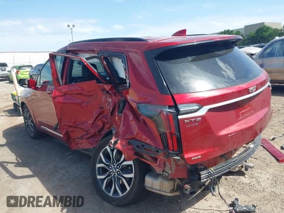 ✅ 2021 Cadillac XT6 Sport • VIN: 1GYKPGRS9MZ136205 • Lot: 39385075. Listed on IAAI with 48,886 mi. Free auction sales archive from the USA and detailed vehicle history report at DreamBid. Image 3.