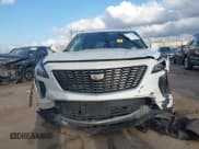 ✅ 2021 Cadillac XT4 FWD Premium Luxury • VIN: 1GYFZCR47MF084998 • Лот: 41483283. Опубликован ранее на IAAI с пробегом Не указан. Бесплатный доступ к архиву аукционных продаж из США и подробный отчёт об истории автомобиля на DreamBid. Изображение 6.