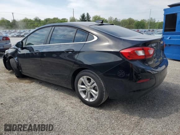 ✅ 2019 Chevrolet Cruze LT • VIN: 1G1BE5SM5K7123884 • Lot: 49351853. Listed on Copart with 77,009 mi. Free auction sales archive from the USA and detailed vehicle history report at DreamBid. Image 2.