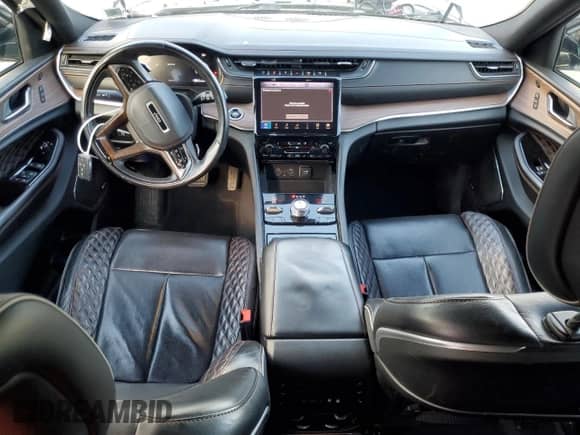 2021 Jeep Grand Cherokee Summit Reserve with VIN 1C4RJKEG5M8105744, listed as a Copart auction lot 84206945 with 83,926 mi miles and Salvage title. Bid and sale history available at DreamBid. Image 8.