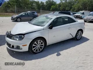 ✅ 2015 Volkswagen Eos Komfort • VIN: WVWBW8AH9FV001847 • Lot: 67123025. Wystawiony na Copart z przebiegiem 98 894 mil. Bezpłatny archiwum sprzedaży aukcyjnych z USA i szczegółowy raport historii pojazdu na DreamBid. Zdjęcie 1.