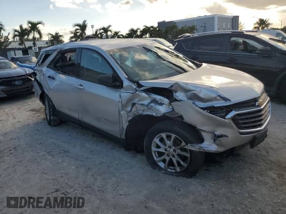 ✅ 2018 Chevrolet Equinox LS • VIN: 2GNAXHEV0J6344625 • Lot: 86138285. Wystawiony na Copart z przebiegiem 89 205 mil mil. Skorzystaj z bezpłatnego archiwum sprzedaży aukcyjnych z USA i zobacz szczegółowy raport historii pojazdu na DreamBid. Zdjęcie 4.