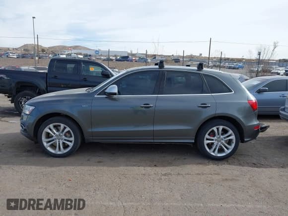 ✅ 2015 Audi SQ5 Premium Plus • VIN: WA1CGAFP3FA056627 • Лот: 41129651. Опубликован ранее на IAAI с пробегом 142 407 миль. Бесплатный доступ к архиву аукционных продаж из США и подробный отчёт об истории автомобиля на DreamBid. Изображение 14.