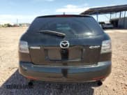 ✅ 2009 Mazda CX-7 Grand Touring • VIN: JM3ER29L590215995 • Lot: 60929585. Listed on Copart with 114,574 mi. Free auction sales archive from the USA and detailed vehicle history report at DreamBid. Image 6.