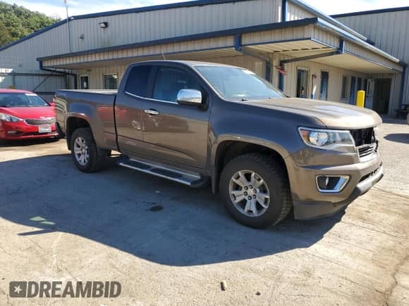 2015 Chevrolet Colorado 4WD LT with VIN 1GCHTBE3XF1151679, listed as a Copart auction lot 84437325 with 156,791 mi miles and Salvage title. Bid and sale history available at DreamBid. Image 4.