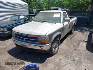 1992 Dodge Dakota S z VIN 1B7GL26X0NS547044, wystawiony jako IAAI lot #42285555 z przebiegiem 74 180 mil mil oraz . Historia ofert i sprzedaży dostępna na DreamBid. Obrazek 2.