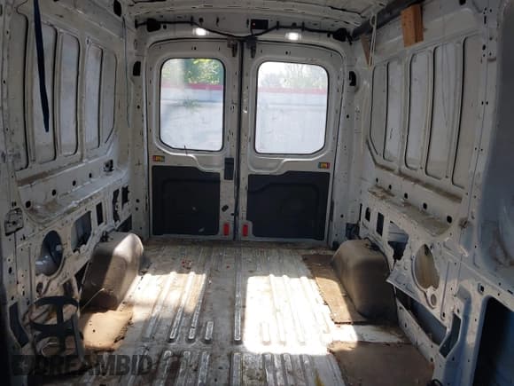 ✅ 2020 Ford Transit Cargo • VIN: 1FTBR1C89LKA80798 • Lot: 42123344. Listed on IAAI with 64,773 mi. Free auction sales archive from the USA and detailed vehicle history report at DreamBid. Image 8.