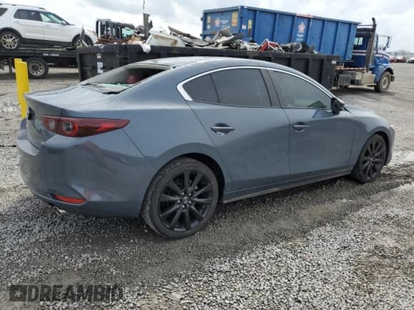 ✅ 2022 Mazda 3 Carbon Edition • VIN: 3MZBPACL1NM309042 • Lot: 51786535. Listed on Copart with 40,053 mi. Free auction sales archive from the USA and detailed vehicle history report at DreamBid. Image 3.