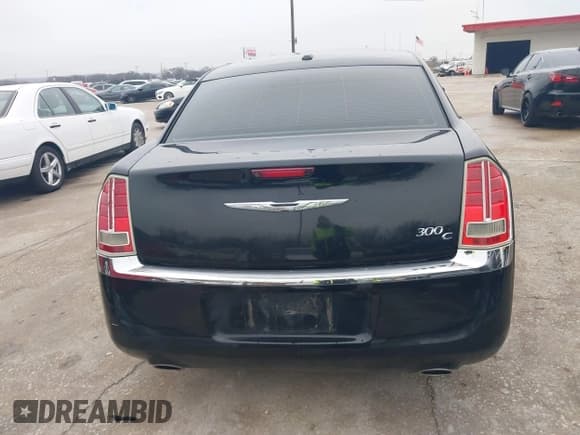 ✅ 2013 Chrysler 300 C • VIN: 2C3CCAEG4DH620971 • Lot: 41540690. Listed on IAAI with 194,003 mi. Free auction sales archive from the USA and detailed vehicle history report at DreamBid. Image 16.
