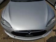 ✅ 2015 Tesla Model S 85D • VIN: 5YJSA1E29FF119133 • Lot: 80439845. Listed on Copart with 133,481 mi. Free auction sales archive from the USA and detailed vehicle history report at DreamBid. Image 11.