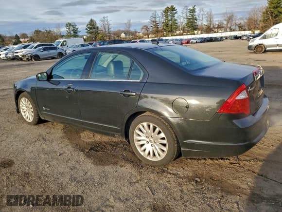 ✅ 2012 Ford Fusion Hybrid • VIN: 3FADP0L39CR309186 • Лот: 93355235. Опубликован ранее на Copart с пробегом 141 374 миль. Бесплатный доступ к архиву аукционных продаж из США и подробный отчёт об истории автомобиля на DreamBid. Изображение 2.