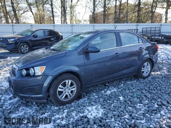 2012 Chevrolet Sonic LT with VIN 1G1JC5SB3C4225574, listed as a Copart auction lot 87488444 with 110,659 mi miles and Salvage title. Bid and sale history available at DreamBid. Image 1.