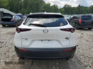 ✅ 2023 Mazda CX-30 Premium • VIN: 3MVDMBDY6PM501160 • Лот: 66601135. Опубликован ранее на Copart с пробегом 28 784 миль. Бесплатный доступ к архиву аукционных продаж из США и подробный отчёт об истории автомобиля на DreamBid. Изображение 6.
