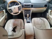 ✅ 2010 Lincoln MKZ • VIN: 3LNHL2GC5AR610348 • Lot: 81887445. Listed on Copart with 166,293 mi. Free auction sales archive from the USA and detailed vehicle history report at DreamBid. Image 8.