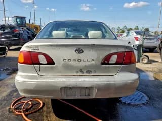✅ 1999 Toyota Corolla LE • VIN: 1NXBR12E4XZ193524 • Lot: 94130255. Listed on Copart with Not provided. Free auction sales archive from the USA and detailed vehicle history report at DreamBid. Image 6.