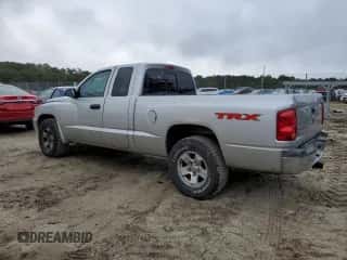 2006 Dodge Dakota SLT с VIN 1D7HE42K46S711939, выставлен на аукционе Copart как лот 73250804 с пробегом 167 221 миль миль и Списание • Salvage title. История ставок и продаж доступна на DreamBid. Изображение 2.