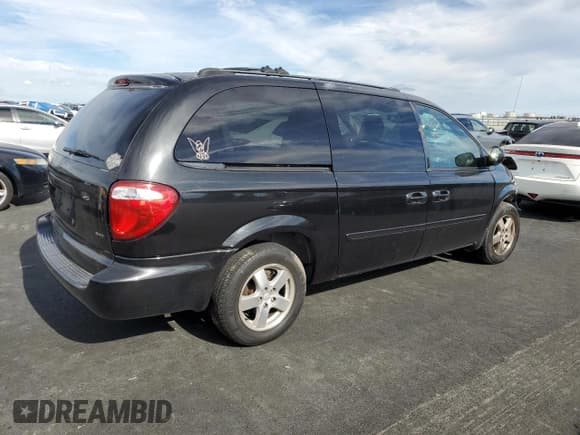 ✅ 2005 Dodge Caravan SXT • VIN: 2D4GP44L55R336071 • Lot: 91312875. Listed on Copart with 284,054 mi. Free auction sales archive from the USA and detailed vehicle history report at DreamBid. Image 3.