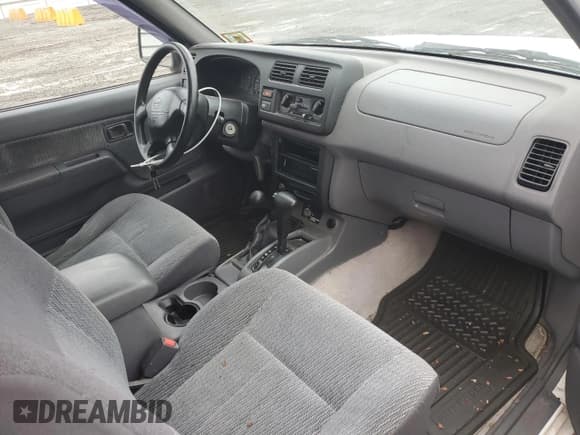 ✅ 1999 Nissan Frontier XE • VIN: 1N6ED26Y4XC302805 • Lot: 86704975. Listed on Copart with 117,046 mi. Free auction sales archive from the USA and detailed vehicle history report at DreamBid. Image 8.