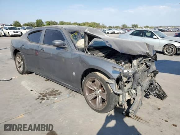 2006 Dodge Charger с VIN 2B3KA43G66H461358, выставлен на аукционе Copart как лот 75743034 с пробегом 257 494 миль миль и Списание • Salvage title. История ставок и продаж доступна на DreamBid. Изображение 4.