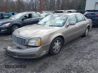 ✅ 2003 Cadillac DeVille • VIN: 1G6KD54Y83U285198 • Lot: 43698428. Listed on IAAI with 123,985 mi. Free auction sales archive from the USA and detailed vehicle history report at DreamBid. Image 2.