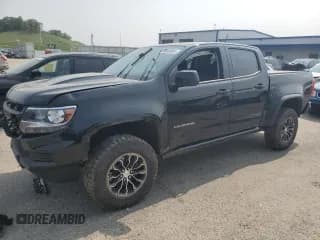 ✅ 2021 Chevrolet Colorado 4WD ZR2 • VIN: 1GCGTEEN4M1222967 • Лот: 59008065. Опубликован ранее на Copart с пробегом 21 985 миль. Бесплатный доступ к архиву аукционных продаж из США и подробный отчёт об истории автомобиля на DreamBid. Изображение 1.
