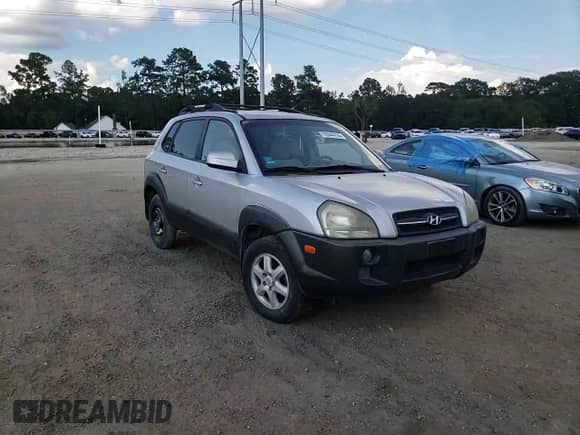 2005 Hyundai Tucson GLS z VIN KM8JN12DX5U212587, wystawiony jako Copart lot #72044114 z przebiegiem 128 993 mil mil oraz Szkoda całkowita • Salvage title. Historia ofert i sprzedaży dostępna na DreamBid. Obrazek 11.