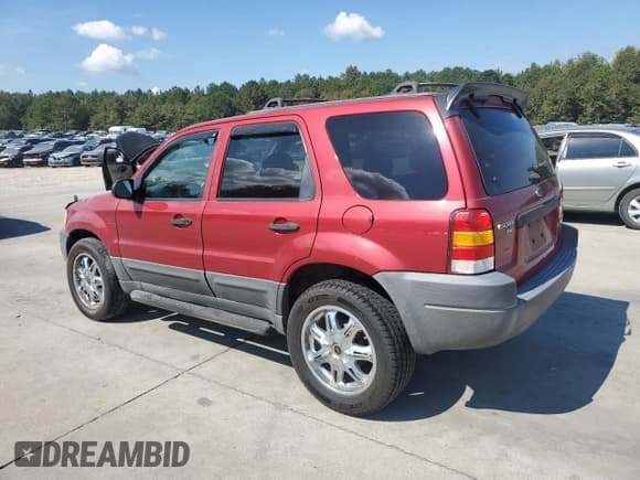 ✅ 2003 Ford Escape XLT Popular • VIN: 1FMYU03193KC16879 • Lot: 80380475. Listed on Copart with 253,867 mi. Free auction sales archive from the USA and detailed vehicle history report at DreamBid. Image 2.