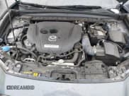 ✅ 2023 Mazda CX-30 Premium • VIN: 3MVDMBDYXPM556775 • Lot: 43704985. Wystawiony na IAAI z przebiegiem 13 700 mil. Bezpłatny archiwum sprzedaży aukcyjnych z USA i szczegółowy raport historii pojazdu na DreamBid. Zdjęcie 10.