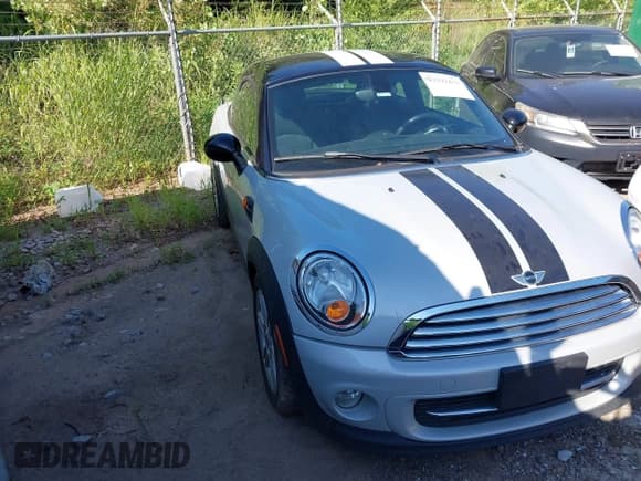 ✅ 2012 MINI Coupe • VIN: WMWSX1C57CT300216 • Лот: 42592431. Опубликован ранее на IAAI с пробегом 66 030 миль. Бесплатный доступ к архиву аукционных продаж из США и подробный отчёт об истории автомобиля на DreamBid. Изображение 1.