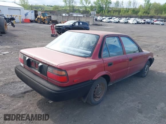 ✅ 1990 Toyota Corolla • VIN: JT2AE91AXL3318396 • Lot: 42186060. Listed on IAAI with 128,403 mi. Free auction sales archive from the USA and detailed vehicle history report at DreamBid. Image 4.