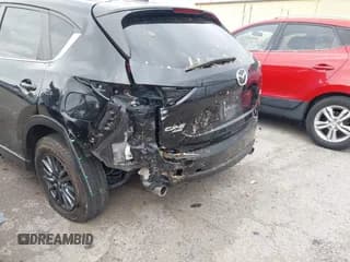 ✅ 2019 Mazda CX-5 Touring • VIN: JM3KFBCM6K0699369 • Lot: 43676847. Wystawiony na IAAI z przebiegiem 63 913 mil. Bezpłatny archiwum sprzedaży aukcyjnych z USA i szczegółowy raport historii pojazdu na DreamBid. Zdjęcie 6.