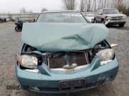 ✅ 2001 Mazda Protege LX • VIN: JM1BJ226510402231 • Lot: 46717595. Wystawiony na Copart z przebiegiem 154 138 mil. Bezpłatny archiwum sprzedaży aukcyjnych z USA i szczegółowy raport historii pojazdu na DreamBid. Zdjęcie 5.