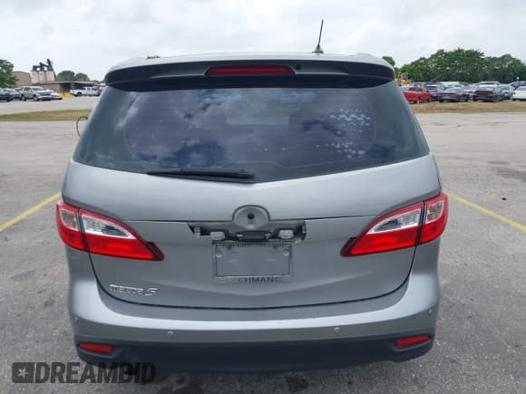 ✅ 2013 Mazda 5 Touring • VIN: JM1CW2CL5D0160104 • Lot: 41722470. Listed on IAAI with 135,708 mi. Free auction sales archive from the USA and detailed vehicle history report at DreamBid. Image 16.