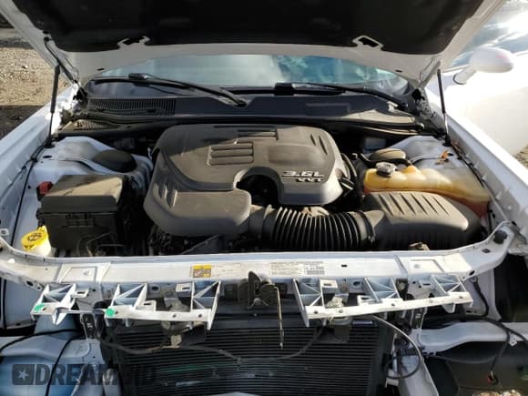 ✅ 2013 Dodge Challenger SXT • VIN: 2C3CDYAG6DH676180 • Lot: 76055914. Wystawiony na Copart z przebiegiem 55 450 mil. Bezpłatny archiwum sprzedaży aukcyjnych z USA i szczegółowy raport historii pojazdu na DreamBid. Zdjęcie 11.