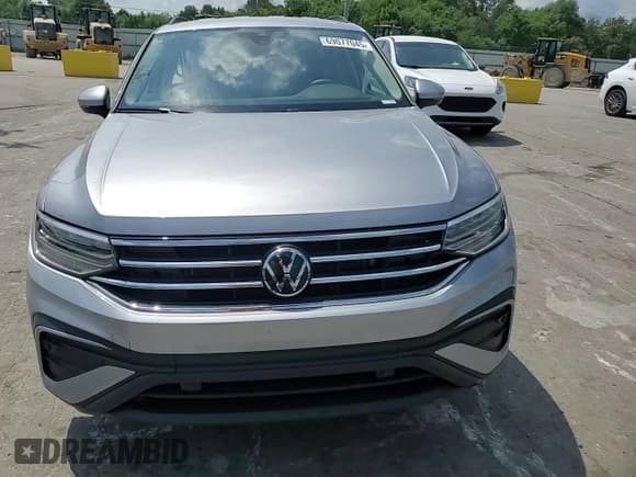 ✅ 2024 Volkswagen Tiguan S • VIN: 3VVRB7AX0RM231210 • Лот: 69077045. Опубликован ранее на Copart с пробегом 6 802 миль. Бесплатный доступ к архиву аукционных продаж из США и подробный отчёт об истории автомобиля на DreamBid. Изображение 14.